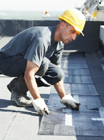 Commercial roofing repair in progress